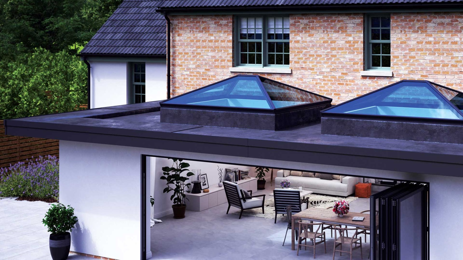 A brick house with skylights extending into an outdoor living area with seating and dining spaces underneath a modern cantilevered structure.