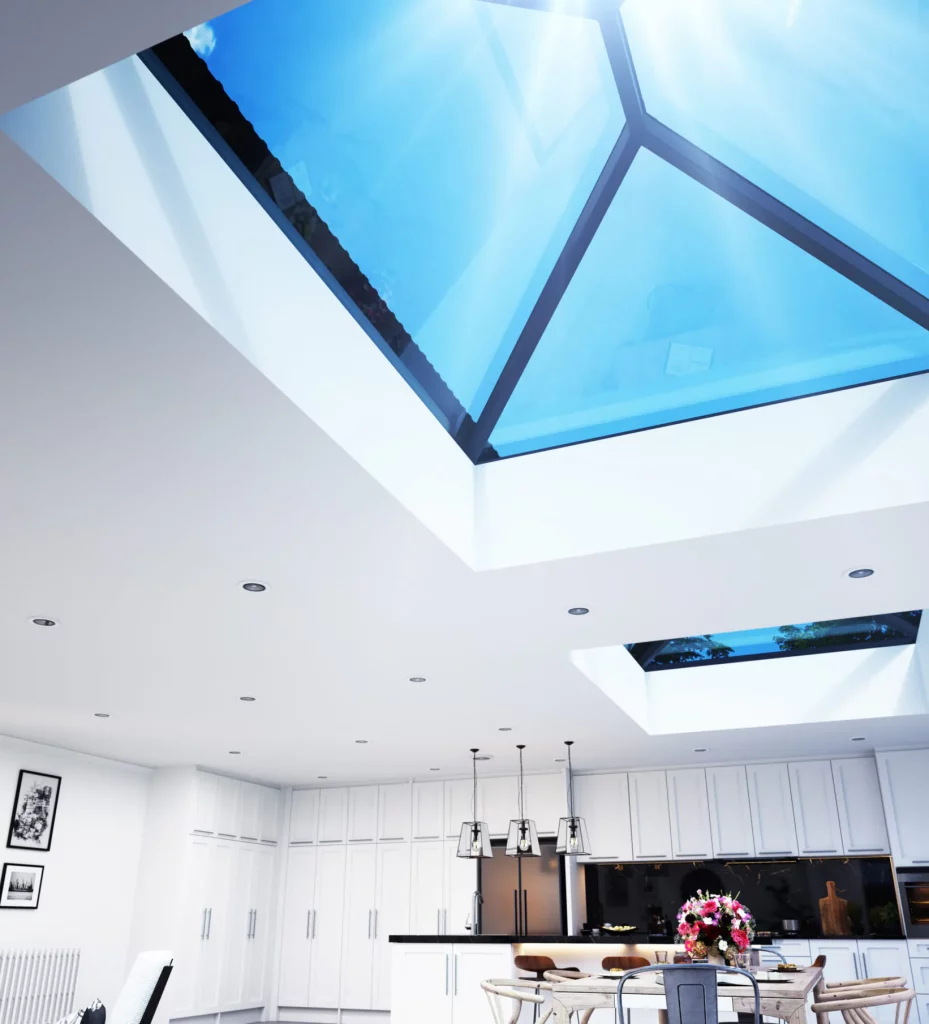 This image shows a Korniche roof lantern installed above a modern kitchen, flooding the space with natural light. It demonstrates how the product enhances the interior design with clean lines and a bright atmosphere.